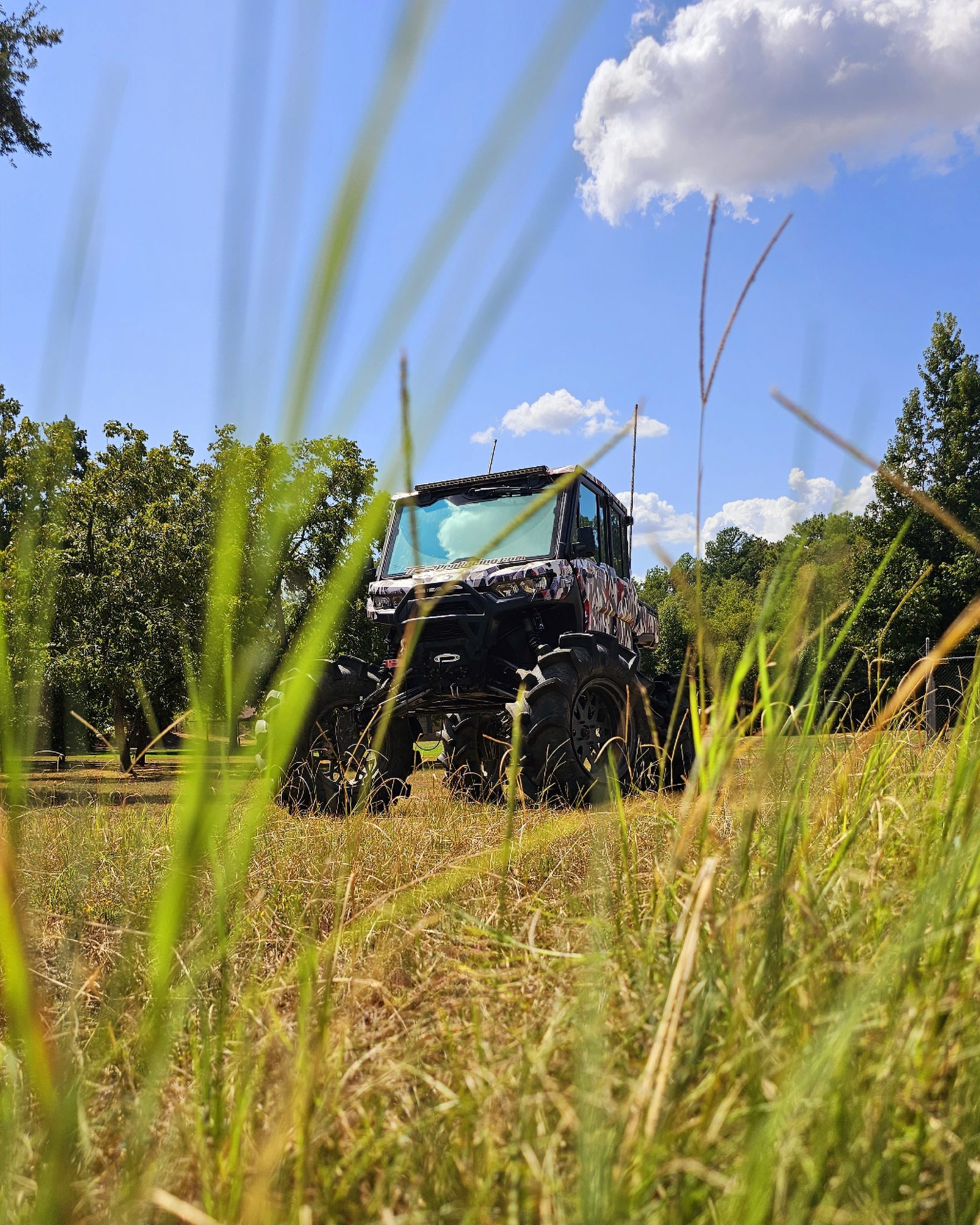 Custom Aftermarket Can-Am Defender Photo In Grass Field